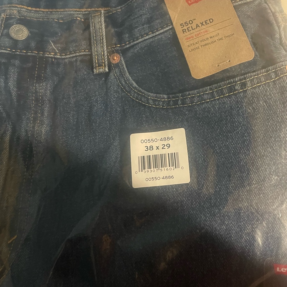 Men’s Levi 550 relaxed jeans still in bag, brand new